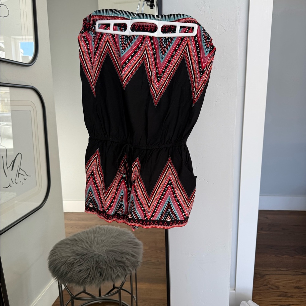 Brand New with tags, strapless, shorts jumpsuit, size medium